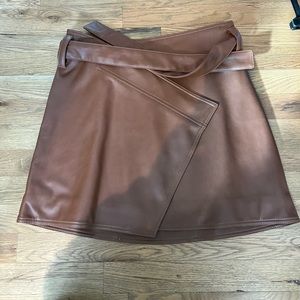 Divine Heritage Faux Leather Wrap Asymmetrical Belted Mini Skirt in Saddle Brown